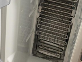 冰箱出水孔堵住的处理方法（快速解决冰箱出水孔堵塞的问题）