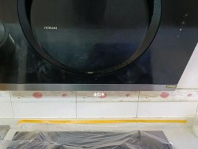清洗油漆污渍的油烟机的方法（轻松去除油烟机上的油漆）