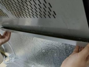 如何拆开清洗7字形油烟机（实用技巧教你清洗油烟机的步骤和注意事项）