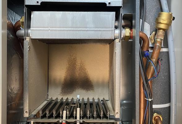 壁挂炉换热器串水故障的原因及解决方法（分析壁挂炉换热器串水故障产生的原因）  第2张